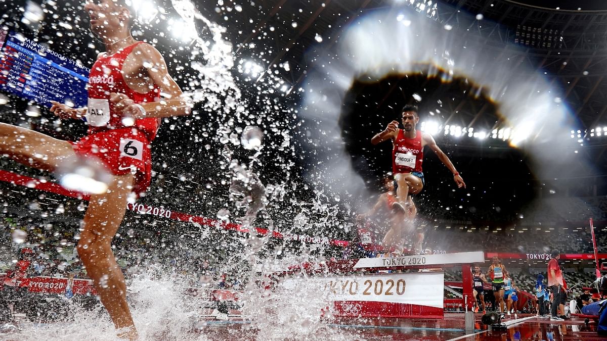 Soufiane Elbakkali of Morocco and Mohamed Tindouft of Morocco in action during the Men's 3000m Steeplechase event at Tokyo 2020 Olympics. Credit: Reuters Photo