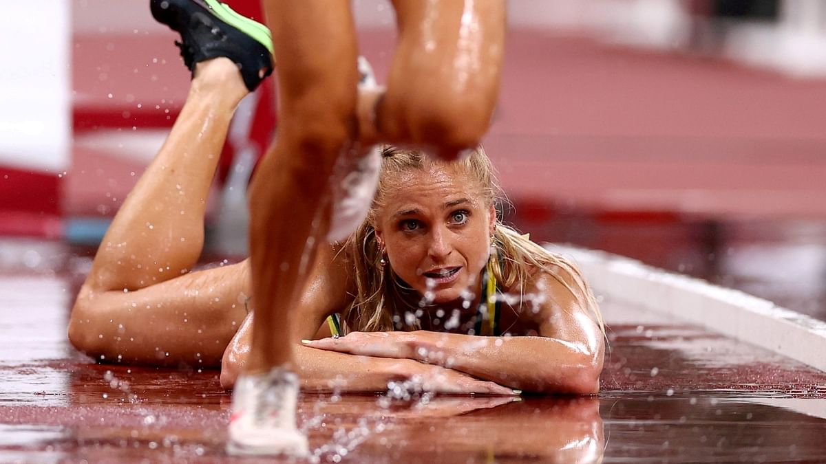 Australia's Genevieve Gregson reacts after falling down during Women's 3000m Steeplechase event at Tokyo 2020 Olympics. Credit: Reuters Photo