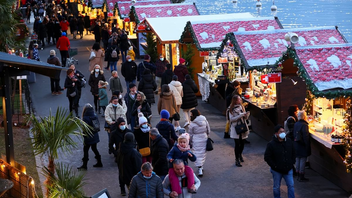 People visit the Christmas Market, amid the coronavirus disease (COVID-19) pandemic, in Montreux, Switzerland. Credit: Reuters Photo