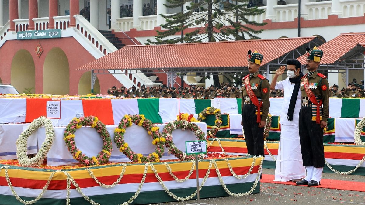 Stalin, seen wearing a black muffler, laid a wreath and paid floral tributes to General Rawat and others and later briefly spoke to the Army brass present there. Credit: AFP Photo