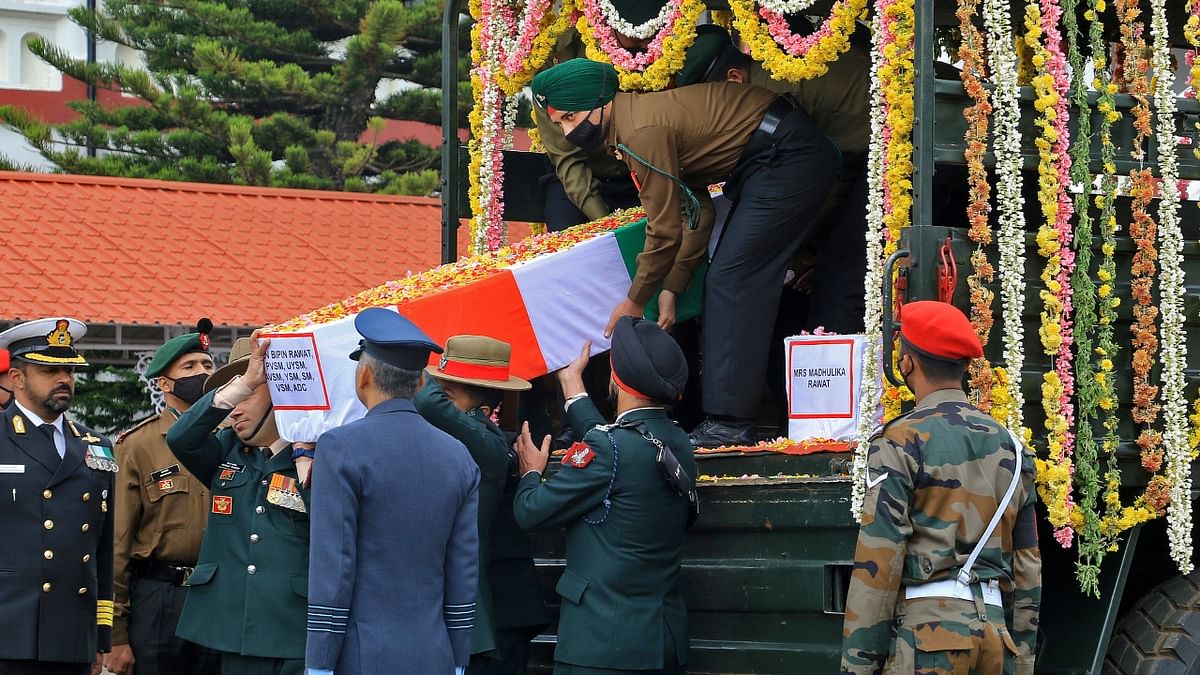 Army officers carry the coffin containing the mortal remains of India's Chief of Defence Staff General Bipin Rawat in Wellington, Tamil Nadu. Credit: Reuters Photo