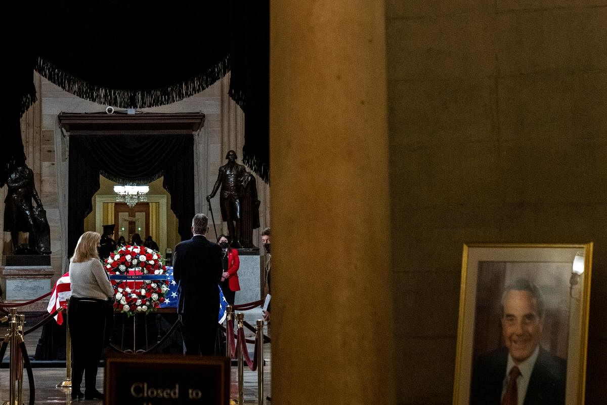 People pay their respects to former Senator Bob Dole (R-KS) as he lies in state at the Rotunda of the US Capitol in Washington. Credit: Reuters Photo