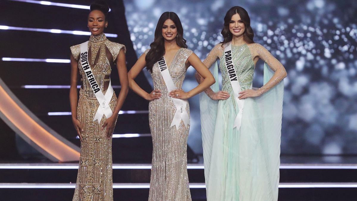 Paraguay's Nadia Ferreira, 22, finished second and South Africa's Lalela Mswane, 24, came third. In this photo, Harnaaz is flanked by Lalela and Nadia. Credit: Reuters Photo