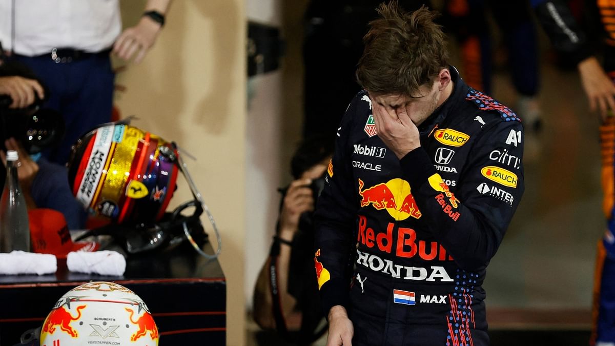 Red Bull's Max Verstappen gets emotional as he celebrates his first F1 win. Credit: Reuters Photo