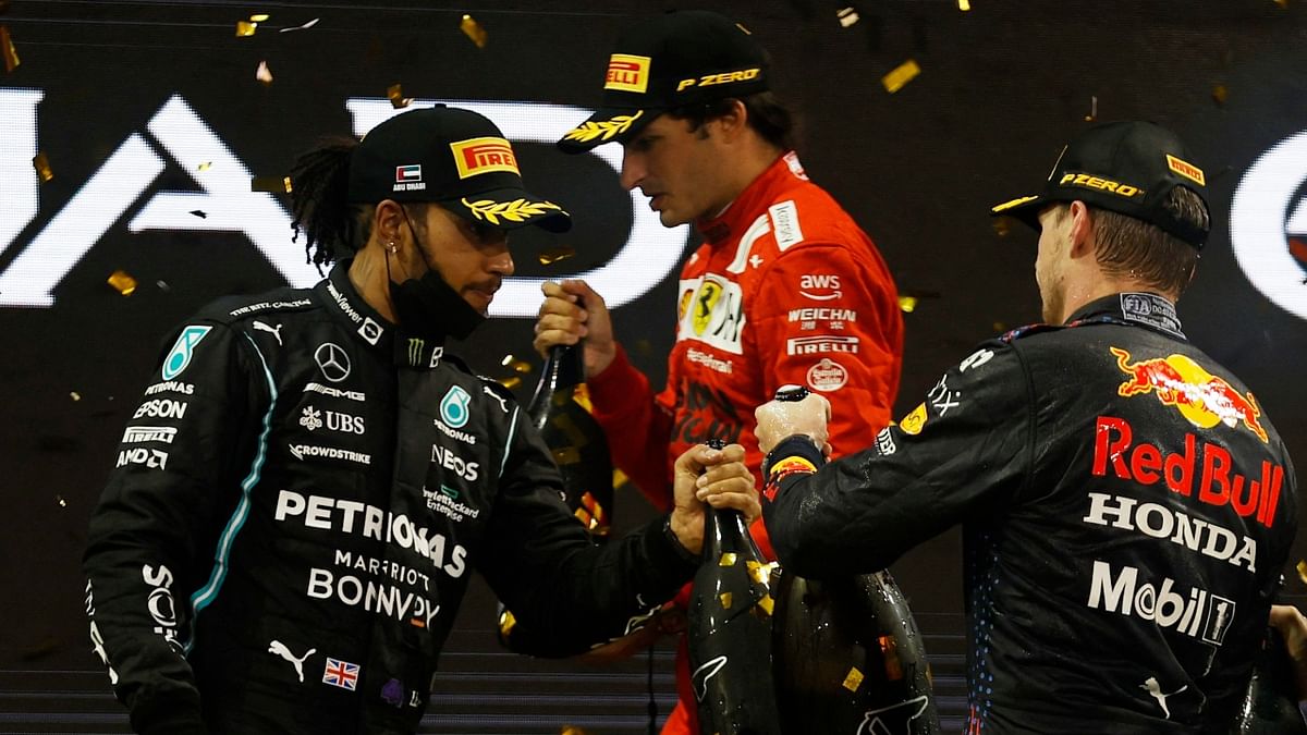 Max overtook his rival Lewis Hamilton in the last lap in the Abu Dhabi Grand Prix to earn his first F1 world title. Credit: Reuters Photo