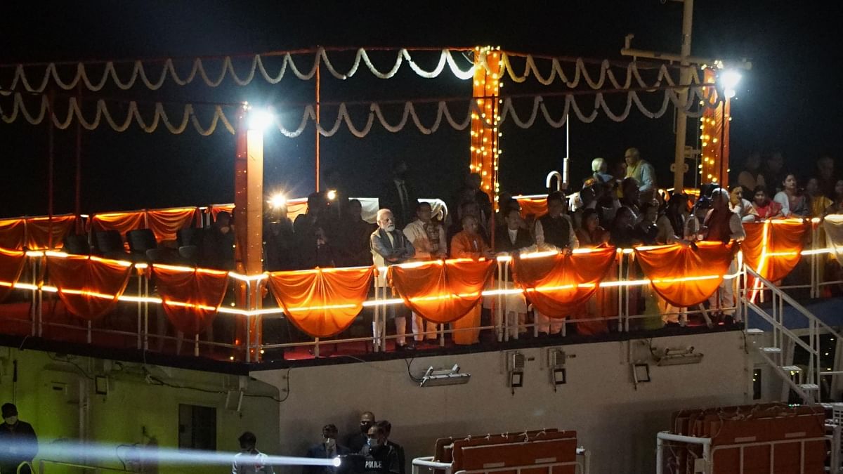 Scintillating fireworks and a spellbinding laser show blazed across the skies as Prime Minister Narendra Modi arrived at the Dashashwamedh Ghat on a cruise ship to attend the 'Ganga Aarti' during his visit to Varanasi. Credit: PTI Photo