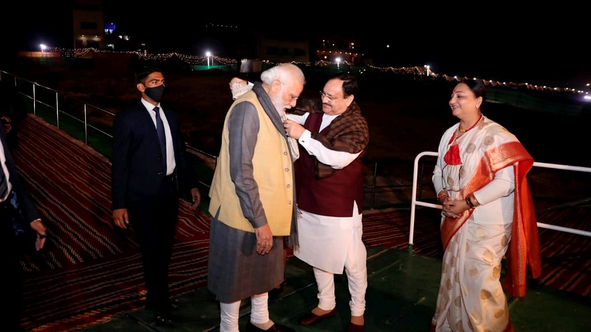 PM Modi was received by BJP president JP Nadda on the cruise. In this photo, Nadda is seen felicitating Prime Minister Narendra Modi. Credit: PTI Photo