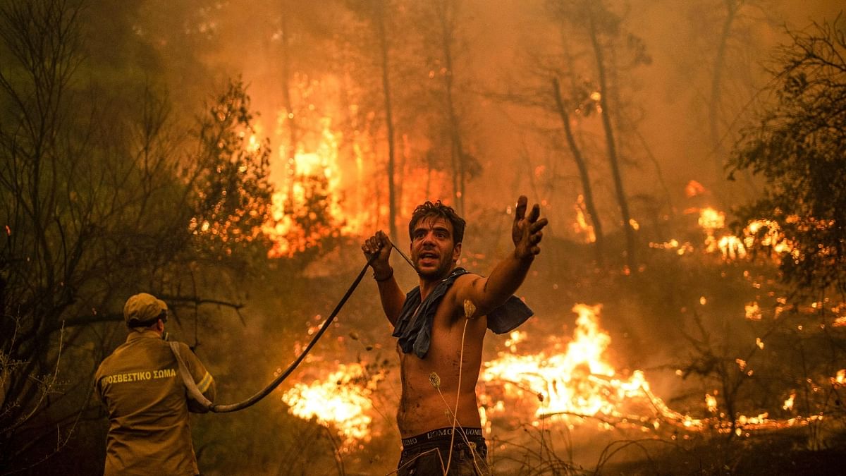 In August, a hot and dry summer fanned intense blazes that forced thousands of people to evacuate their homes in Algeria, Greece and Turkey. Credit: AFP Photo