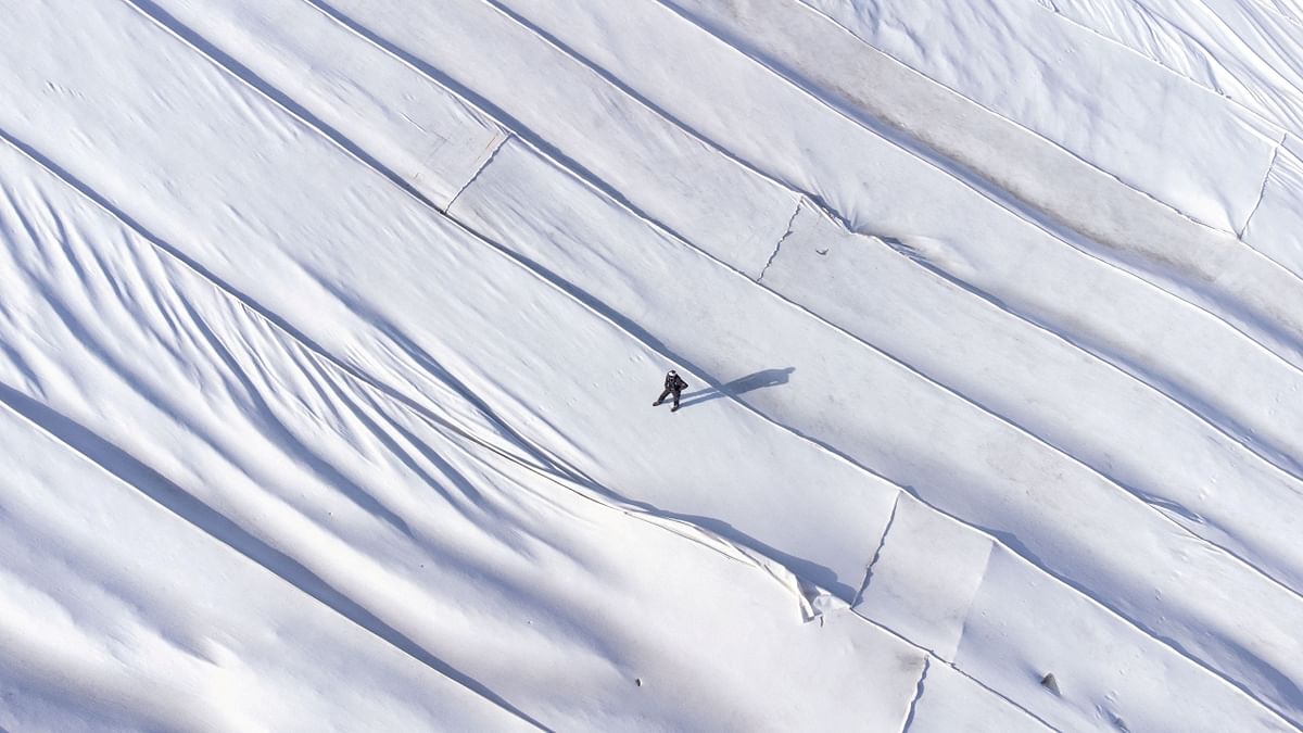 Nearly all the world's mountain glaciers are retreating due to global warming. In the Alps, Swiss resort employees laid protective blankets over one of Mount Titlis's glaciers during the summer months to preserve what ice is left in the month of August. Credit: Reuters Photo