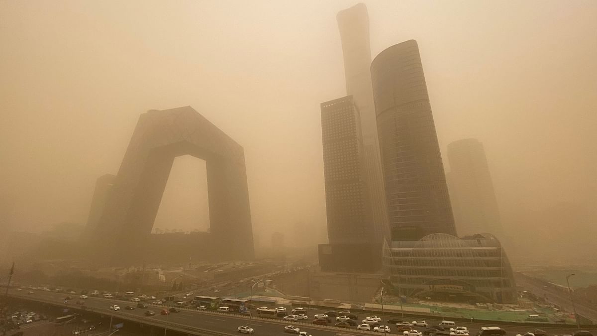 In March, Chinese capital Beijing faced one of the worst sandstorms in a decade, disrupting flight services as skies turned orange due to the dust storm. Credit: AFP Photo