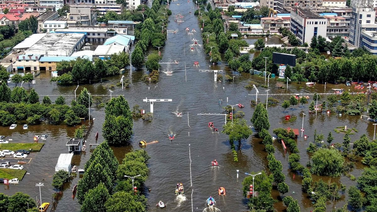 Catastrophic flooding paralysed China's Henan province when a year's worth of rain fell in just three days in July. Credit: AFP Photo