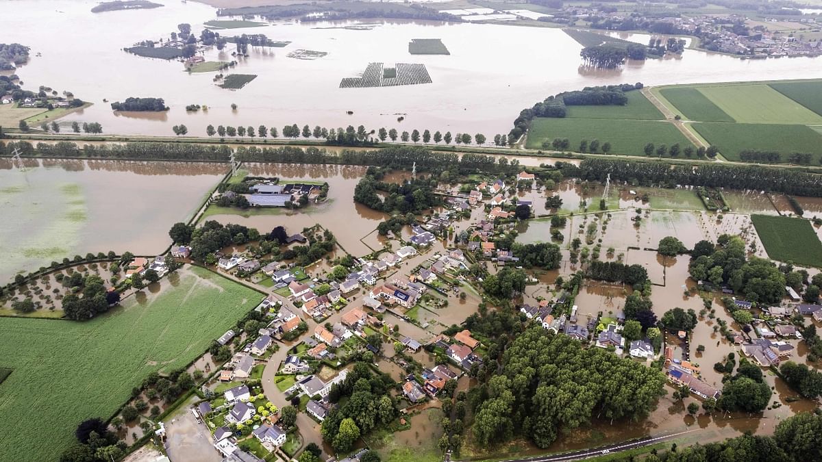 Meanwhile in Europe, hundreds of people died as torrential rains that submerged Germany, Belgium and the Netherlands. Scientists concluded that climate change had made the floods 20% more likely to occur. Credit: AFP Photo
