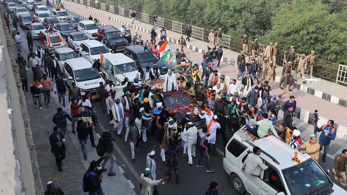 Celebrating their victory, Tikait and other farmers will reach their home via Sisauli, Modinagar, Meerut, Daurala Toll Plaza and Mansurpur. Credit: Reuters Photo