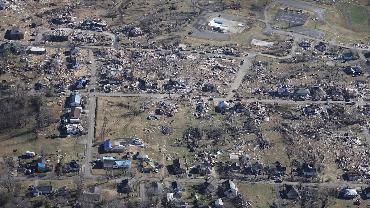 Days after the tornadoes hit, officials are still struggling to establish the toll as emergency responders pick through the rubble of thousands of damaged or destroyed homes and buildings. Credit: AFP Photo