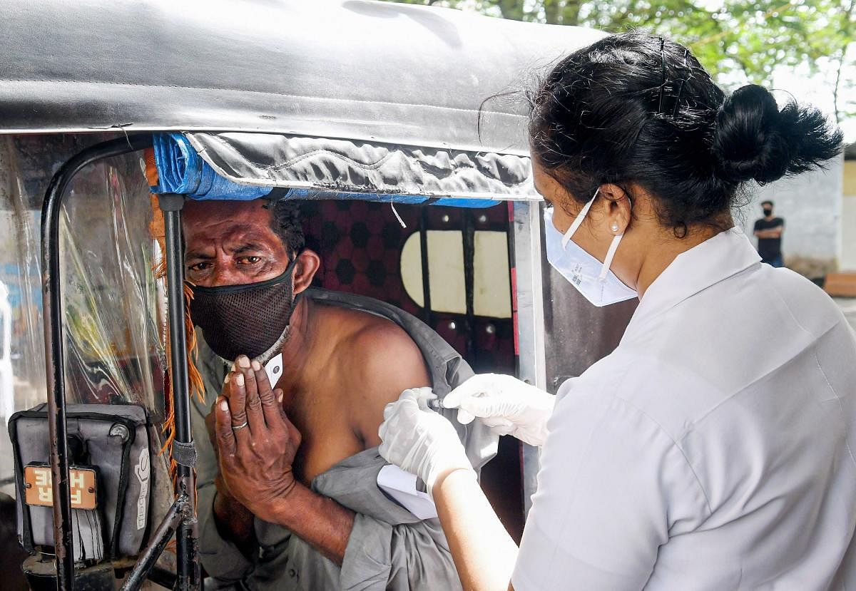 Kerala | Four more persons in Kerala were detected with the Omicron variant of Covid-19, taking the total Omicron cases in the state to five. While two of them were contacts of the first patient, one person is a UK returnee and the other a Congo returnee. The first patient had also returned from the UK. Credit: PTI Photo