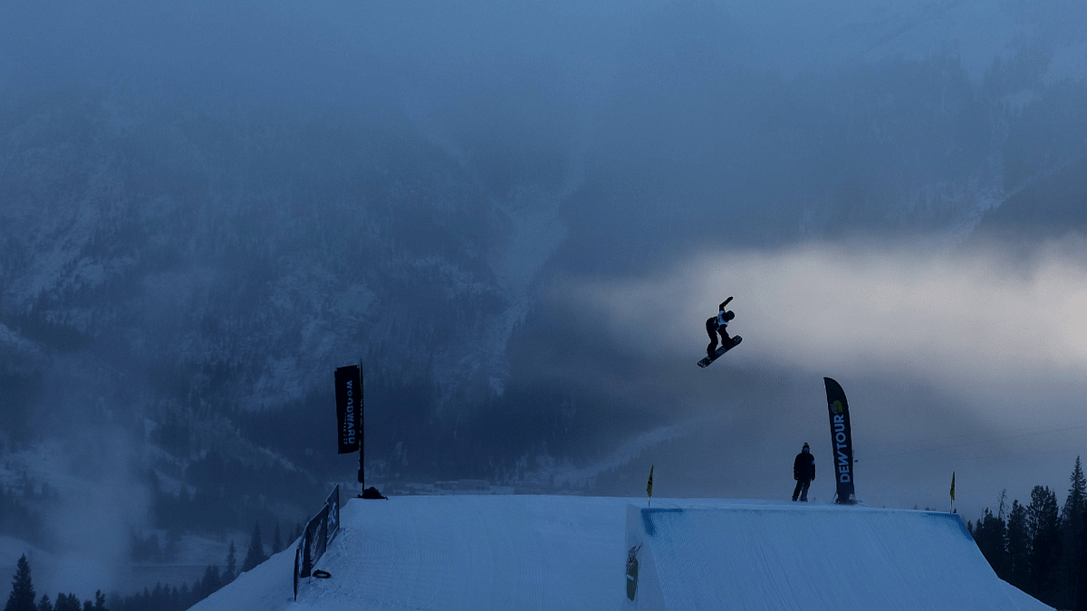 Annika Morgan of Team Germany goes over a jump during a practice run before the start of the women's snowboard slopestyle final on Day 4 of the Dew Tour at Copper Mountain. Credit: AFP Photo