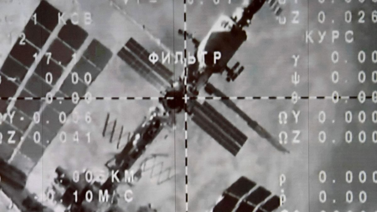 The International Space Station (ISS) is seen on the monitor after the Soyuz MS-20 space craft undocked from the ISS, starting the landing of the International space crew including Japanese space tourists Yusaku Maezawa and his assistant Yozo Hirano, and Russian cosmonaut Alexander Misurkin, at Mission Control Center in Korolyov. Credit: AFP Photo