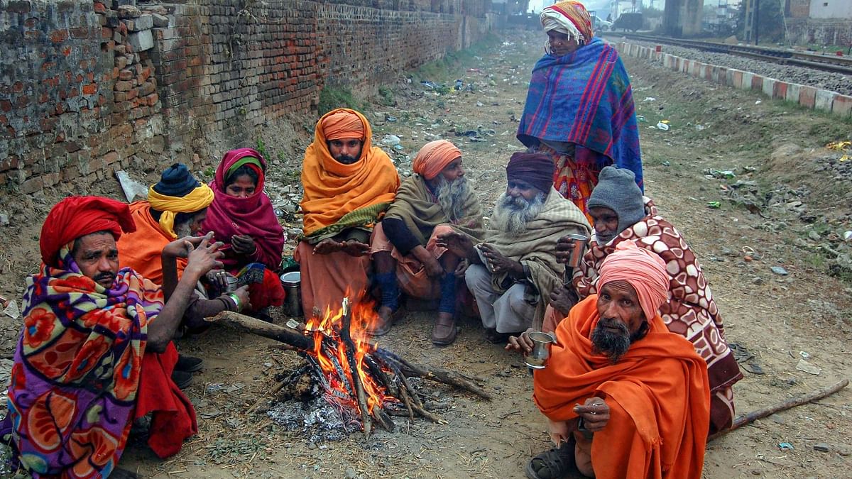 In the plains, the IMD predicts a cold wave condition if the minimum temperature dips to 4 degrees Celsius. A cold wave is also declared when the minimum temperature is 10 degrees Celsius or below and is 4.5 notches less than normal. Credit: PTI Photo