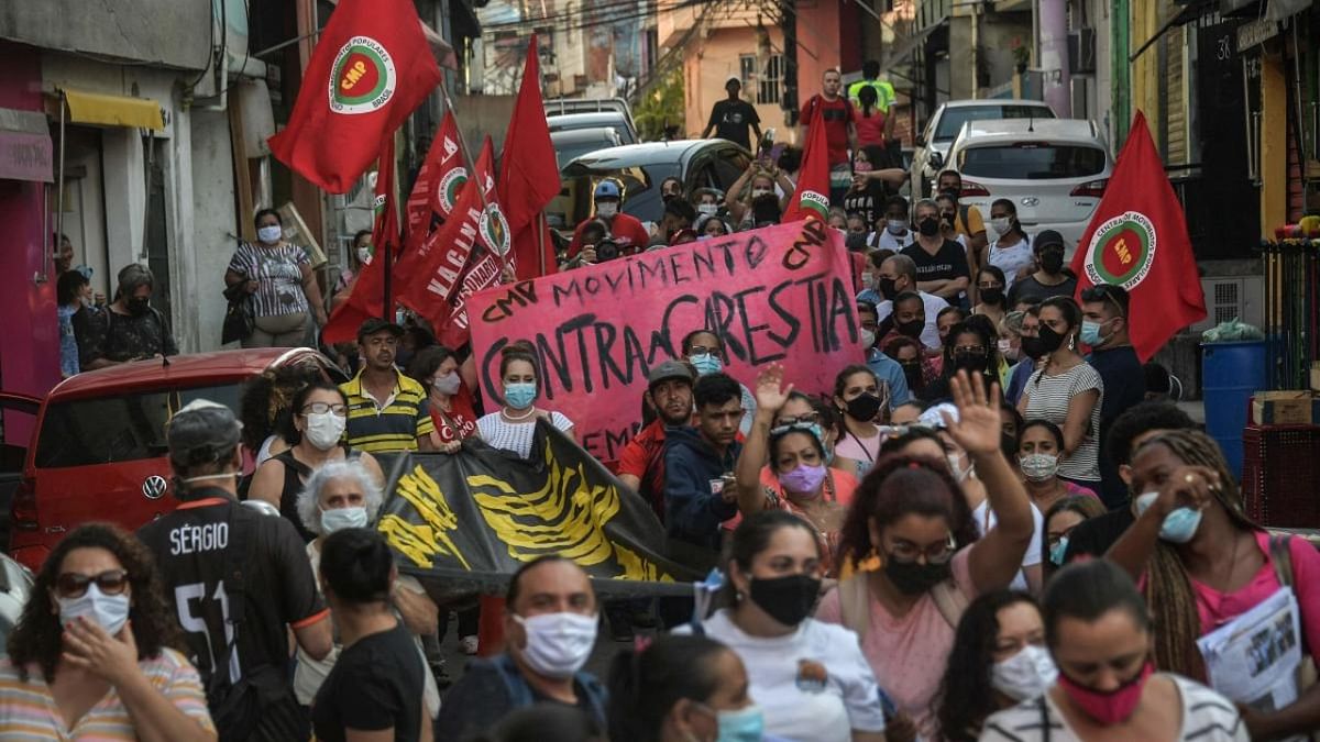Residents and activists from the Popular Movements Central (CMP), protest against hunger and unemployment, in Heliopolis, the largest favela in Sao Paulo, Brazil. Credit: AFP Photo