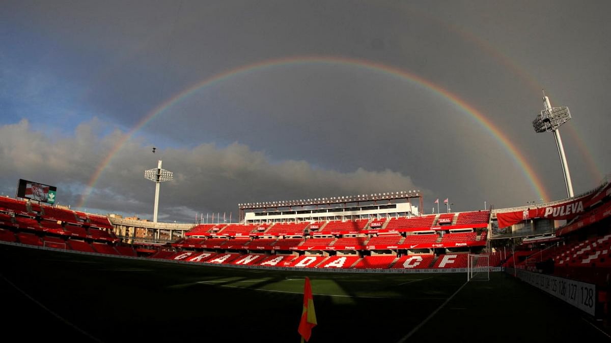 A rainbow is seen over the Nuevo Estadio de Los Carmenes stadium in Granada, Spain. Credit: Reuters photo