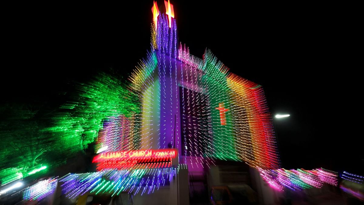 Traffic moves past illuminated Alliance Church ahead of Christmas celebrations in Ahmedabad. Credit: Reuters Photo