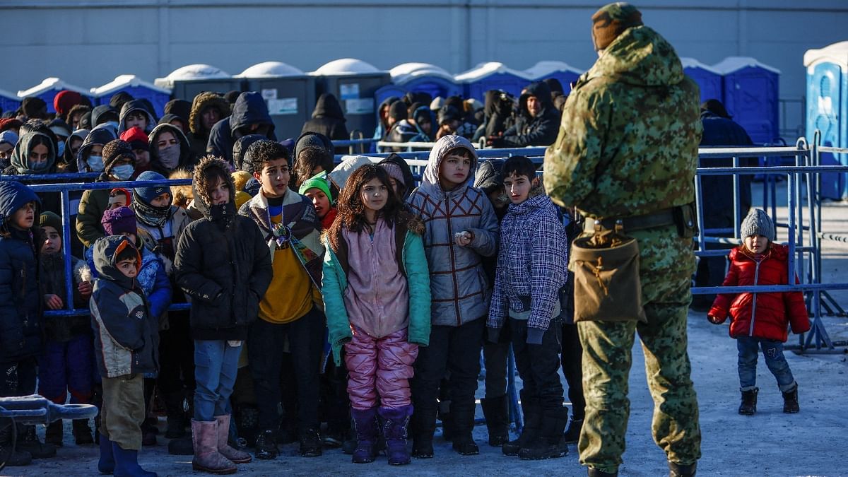 In November, thousands of mainly Middle Eastern migrants camped out in freezing temperatures on Belarus' border with Poland seeking to cross into the EU. Credit: Reuters Photo