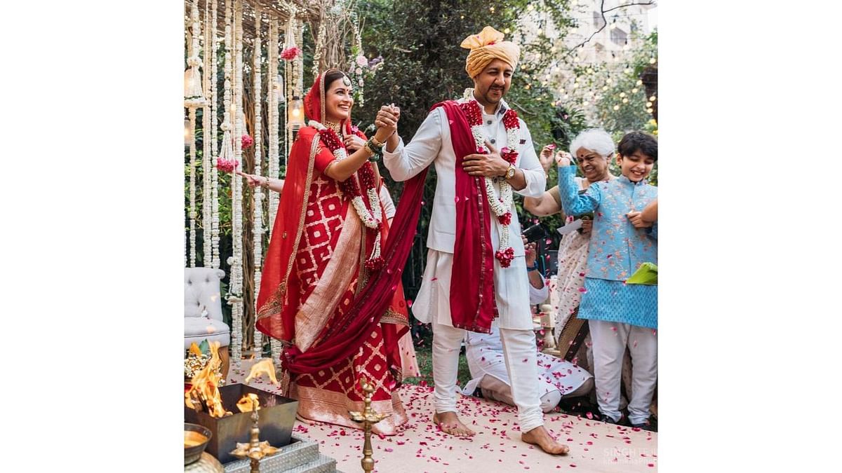 Dia Mirza tied the knot with businessman Vaibhav Rekhi in an intimate ceremony in Mumbai. The couple got married as per the Hindu rituals in the garden area of Mirza's Bandra residence. The ceremony was attended by the duo's family and close friends. Credit: Instagram/diamirzaofficial