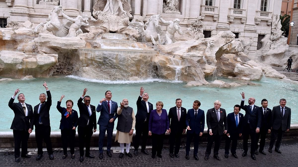 In October, G20 leaders adopt a historic global agreement for a minimum 15 per cent corporate tax. Some 136 countries representing more than 90 per cent of global GDP sign the OECD-brokered deal to more fairly tax multinational companies. Credit: AFP Photo