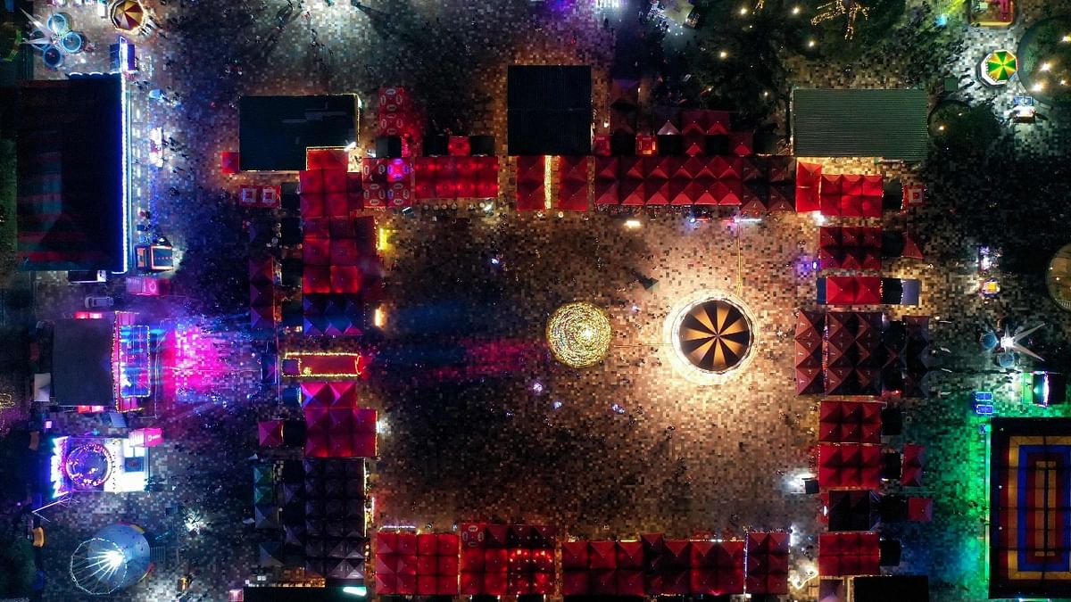 Aerial view of Skanderbeg Square in Tirana, lit with Christmas decorations and surrounded by an open Christmas market. Credit: AFP Photo