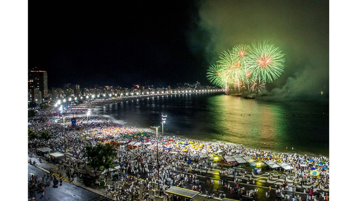 Fireworks go off on Copacabana beach to mark the New Year in Rio de Janeiro, Brazil. Credit: AFP Photo