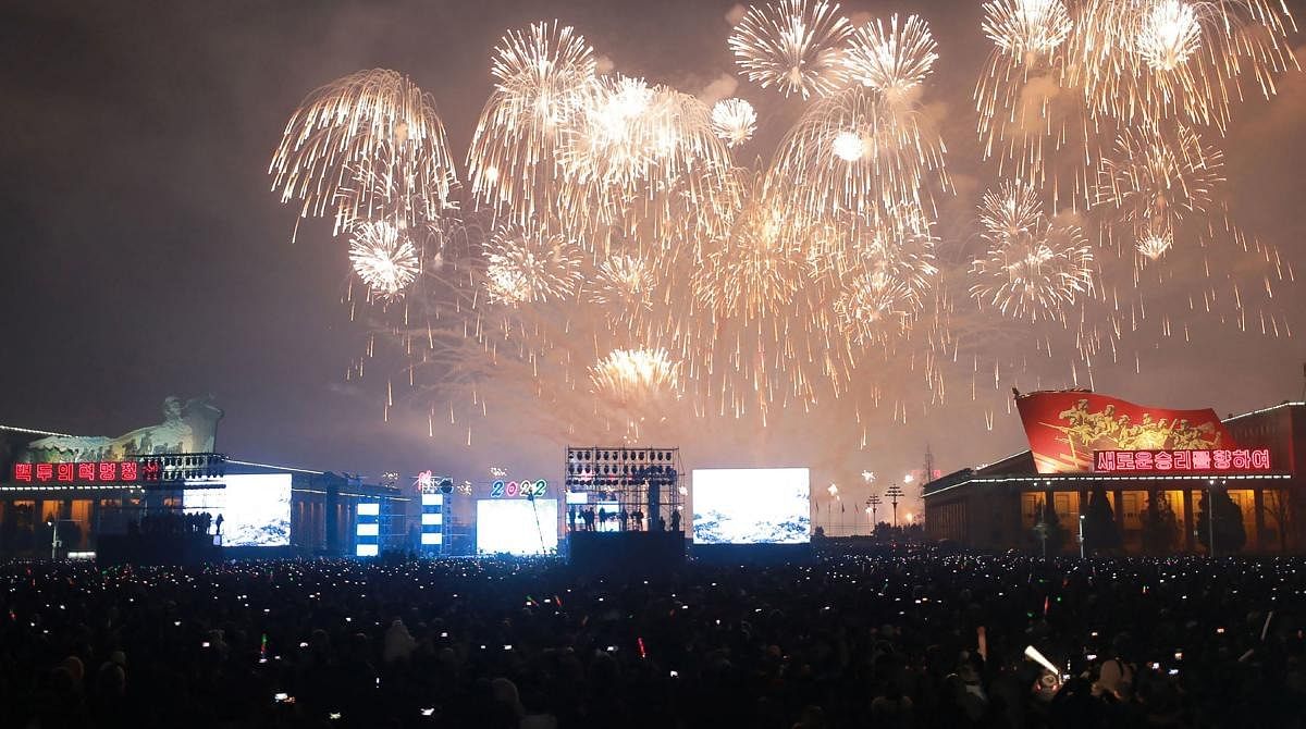 Photo shows fireworks launched at Kim Il Sung Square in Pyongyang at midnight to celebrate the New Year. Credit: AFP Photo