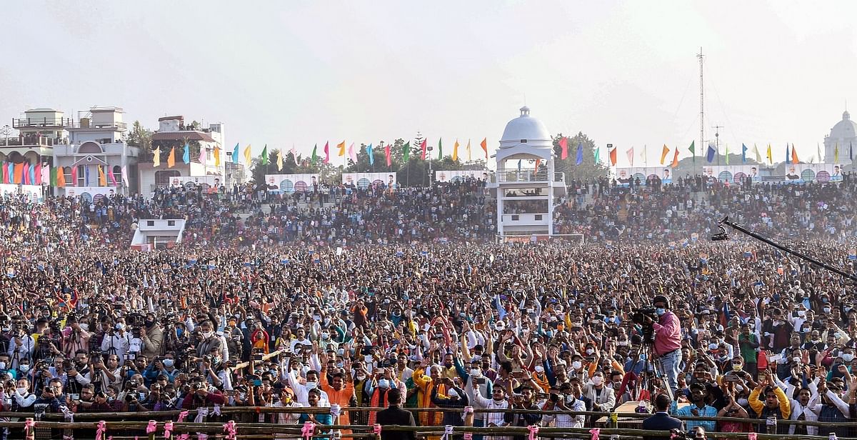 Supporters attend Prime Minister Narendra Modi's programme, in Agartala. Credit: PTI Photo