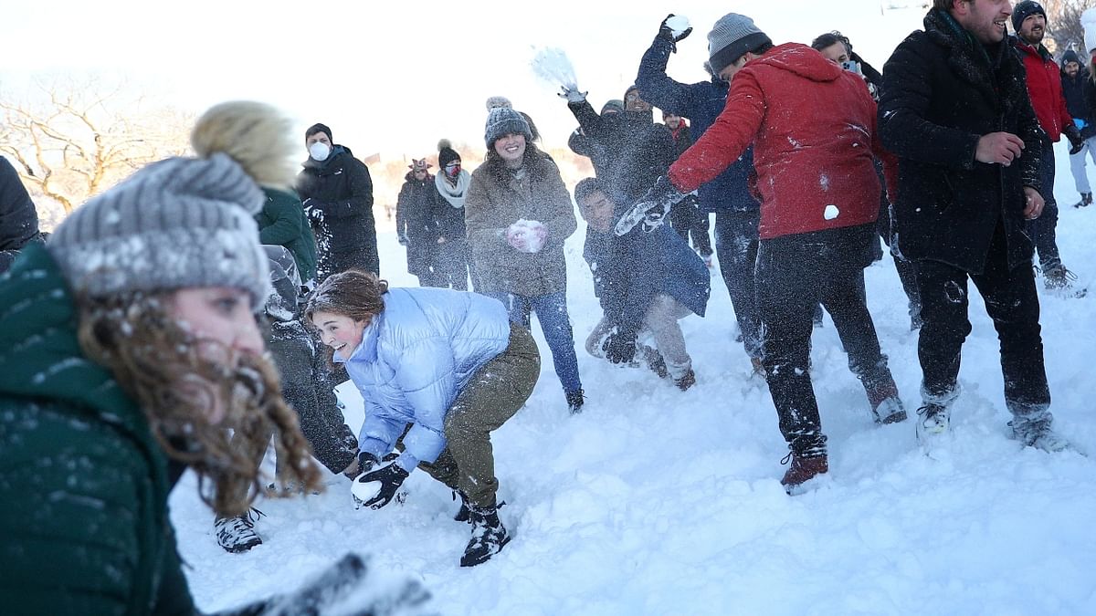 People in Washington DC welcomed the first snow of 2022 with a giant snowball skirmish in front of US Capitol. Credit: Reuters Photo