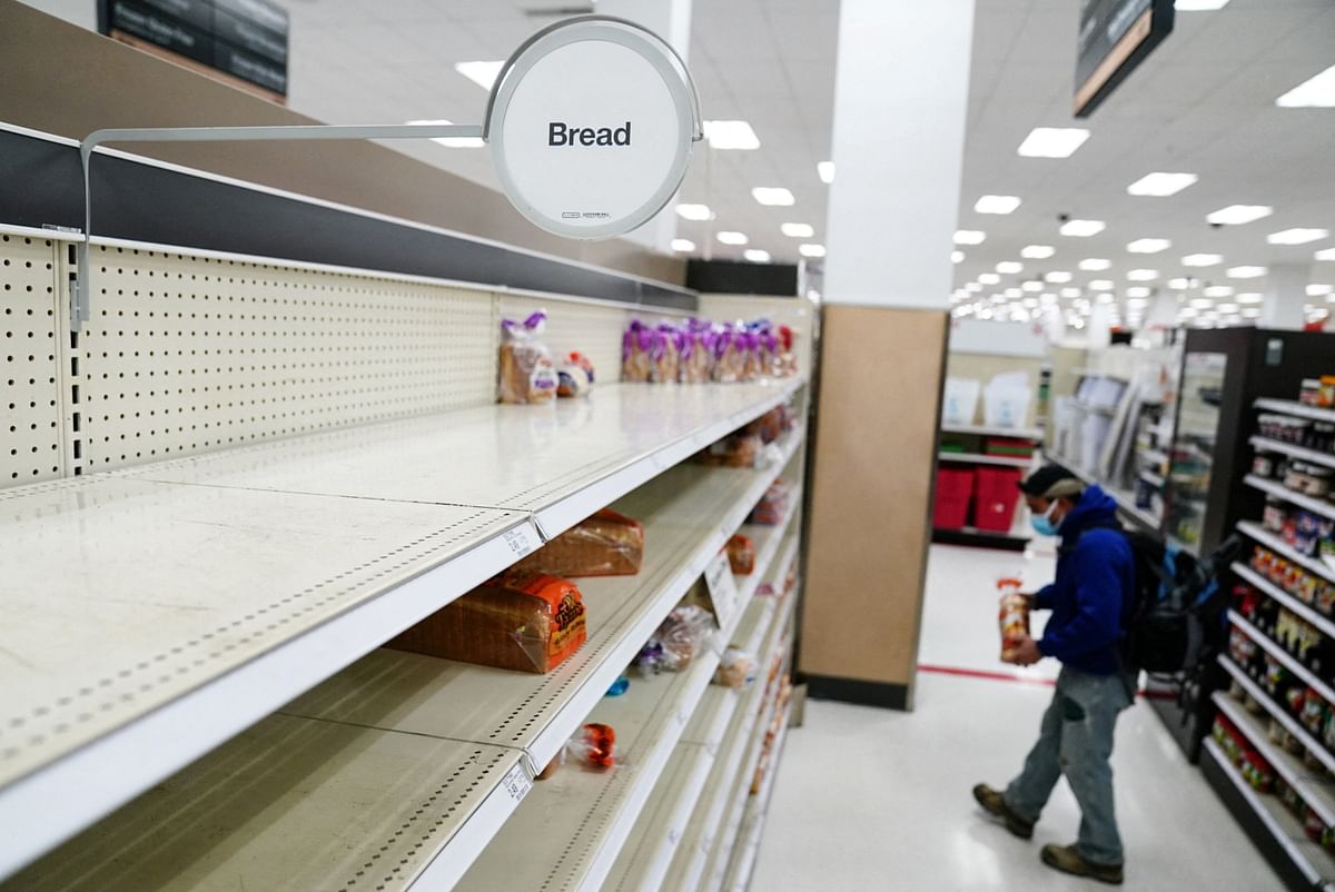 Bread aisle shelves at a Target are seen nearly empty as the US continues to experience supply chain disruptions in Washington. Credit: Reuters Photo