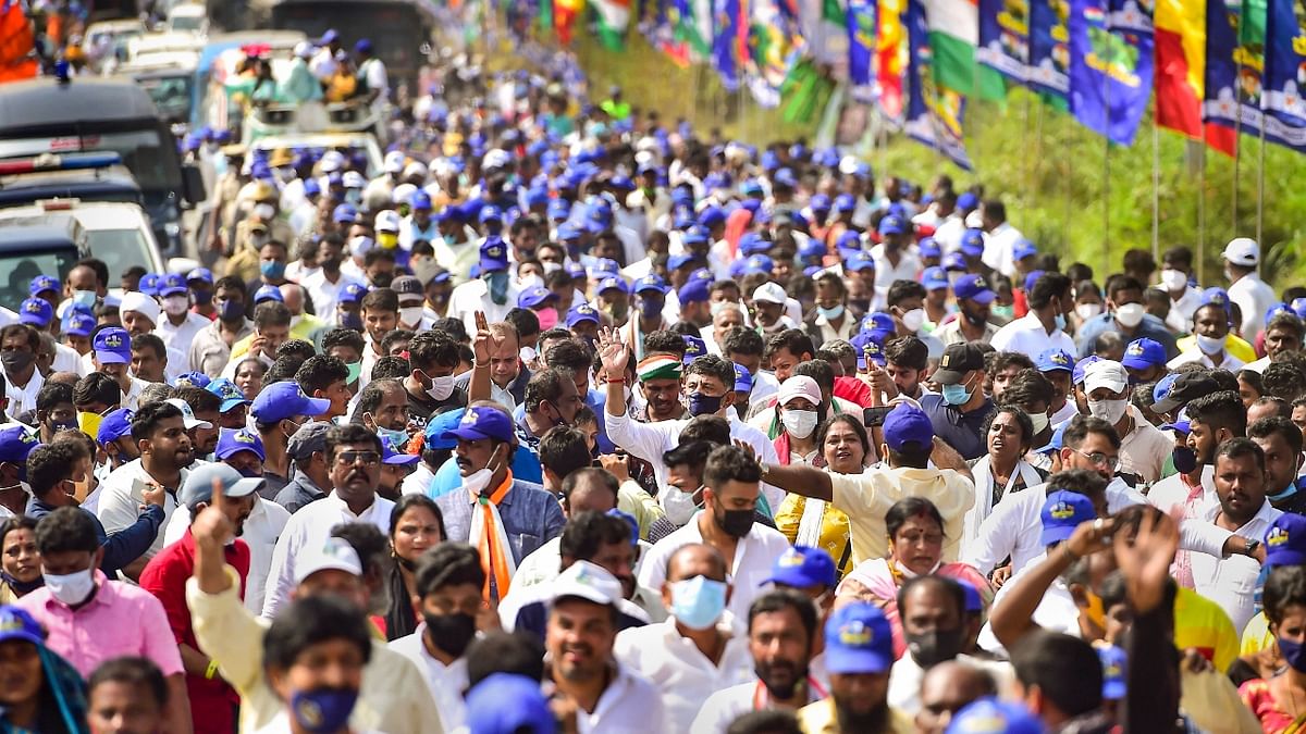 FIRs have been registered for violation of Covid rules and prohibitory orders, under the Disaster Management act and sections of IPC. However, Congress leaders and workers are continuing their march for the second day, and are scheduled to cover a distance of about 15 km from Shivakumar's native Doddalahalli to Kanakapura. Credit: PTI Photo
