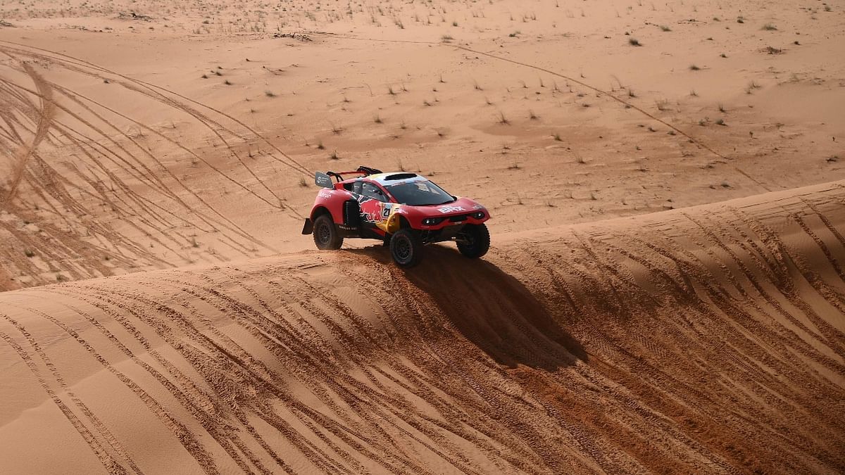 French driver Sebastien Loeb and co-driver Fabian Lurquin of Belgium compete during Stage 3 of the Dakar Rally 2022 between the Saudi areas of al-Artawiya and al-Qaysumah, in UAE. Credit: AFP Photo