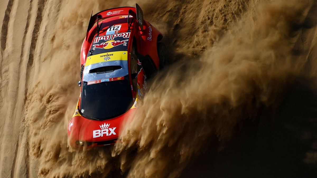 French driver Sebastien Loeb and co-driver Fabian Lurquin of Belgium compete during the Stage 1A of the Dakar Rally 2022 between Jeddah and Hail, in Saudi Arabia. Credit: AFP Photo
