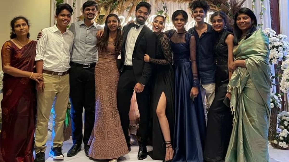 Reba and Joe flanked by their friends and family at their reception ceremony in Bengaluru. Credit: Instagram/_chezda_