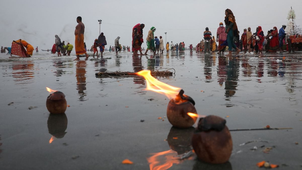 Authorities in Odisha also banned religious gatherings at river banks and ghats on Makar Sankranti, while the Uttarakhand government also disallowed devotees from taking a dip in the Ganga at Haridwar and Rishikesh in view of the coronavirus surge. Credit: Reuters Photo