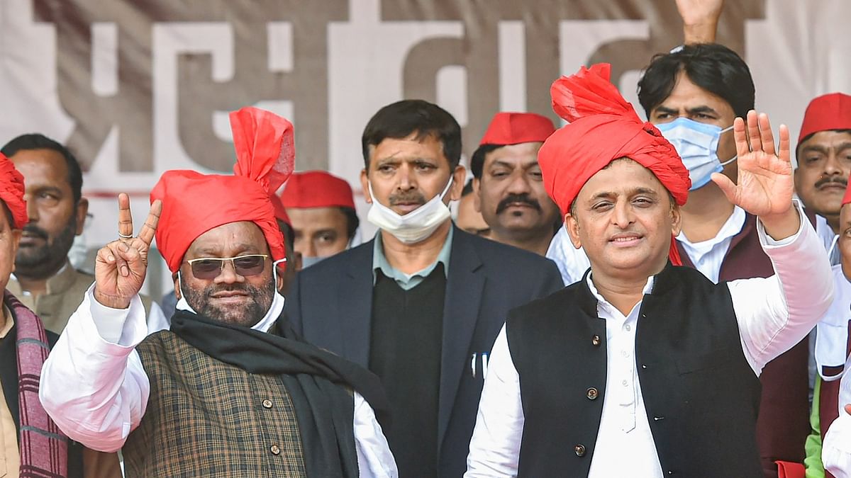 Former UP minister Swami Prasad Maurya joined the Samajwadi Party in presence of party chief Akhilesh Yadav at the SP office in Lucknow. Three MLAs close to Maurya, Bhagwati Sagar, Raushan Lal Verma, and Brijesh Prajapati, also joined the SP on the same day. Credit: PTI Photo