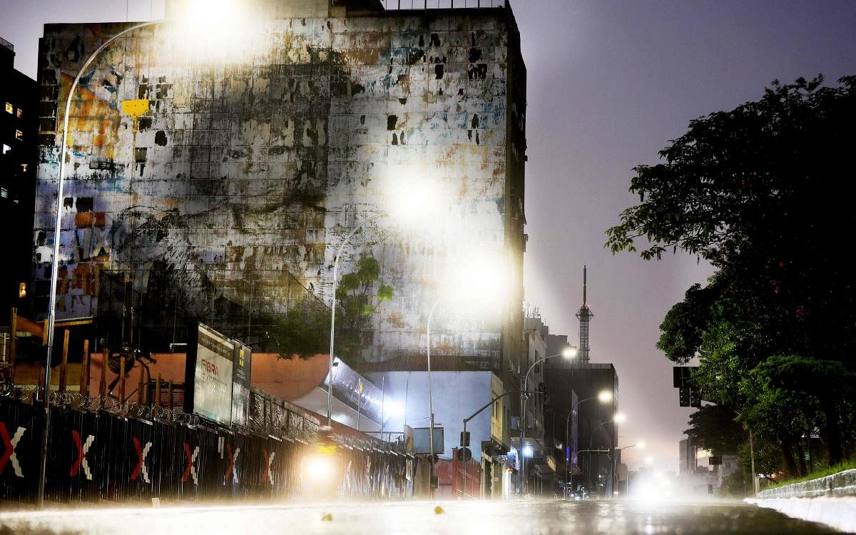 View of a mural by Brazilian photographer Francio de Holanda, depicting late Brazilian singer and songwriter Elza Soares, 91, in downtown Sao Paulo, Brazil. Samba singer Elza Soares, often referred to as the Brazilian Tina Turner, died aged 91 in Rio de Janeiro on Thursday, her press office said. Credit: AFP Photo