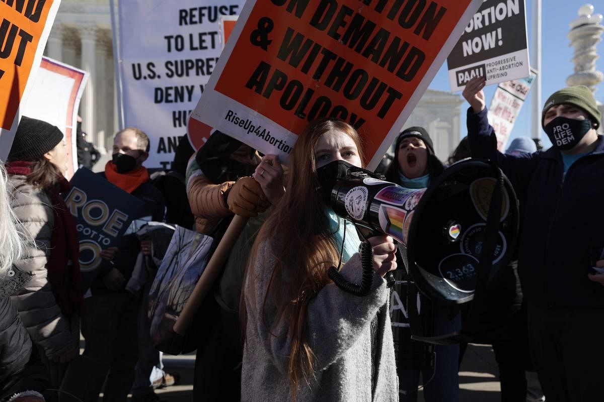 Anti-abortion protesters demonstrate at a rally put on by the