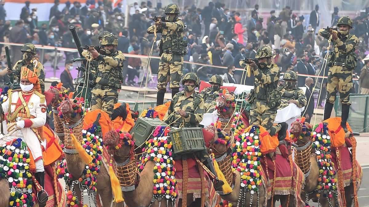 Camel mounted BSF contingent march during the full dress rehearsal of the Republic Day Parade 2022 at the Rajpath in New Delhi. Credit: PTI Photo