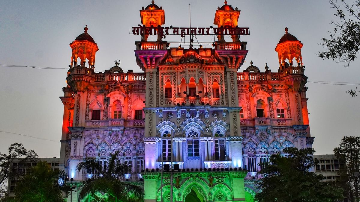 Municipal Corporation building decorated with tricolour lights ahead of the Republic Day, in Solapur, Maharashtra. Credit: PTI Photo