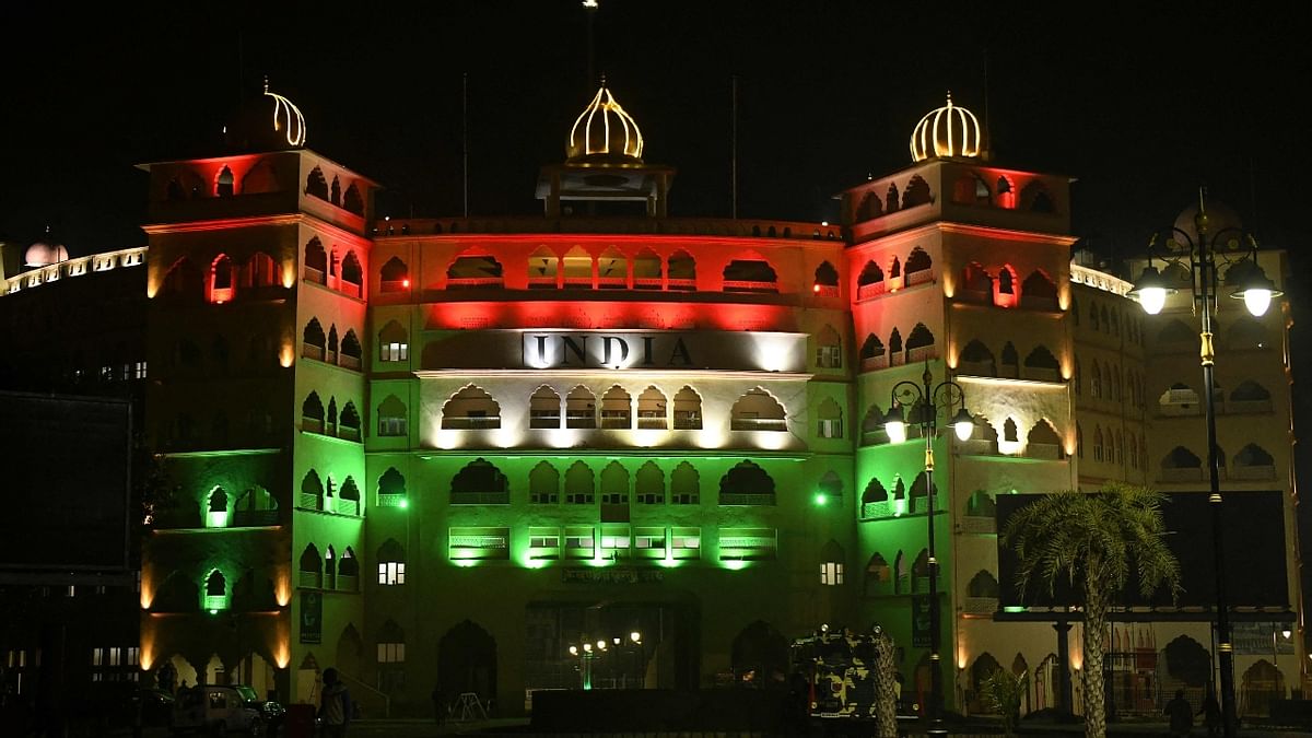 Indian tourists gallery is illuminated with the national flag's colours ahead of the Republic Day at India Pakistan Wagah Border post about 35 km from Amritsar. Credit: AFP Photo