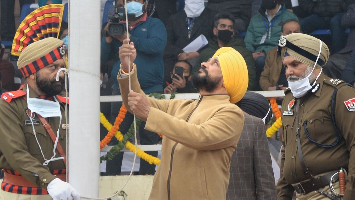 Punjab Chief Minister Charanjit Singh Channi hoists the National Flag during the 73rd Republic Day Parade, in Jalandhar. Credit: PTI Photo