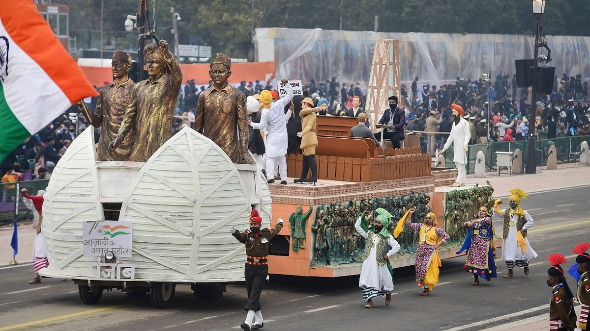 Martyrs and independence movement was the theme of the poll-bound Punjab tableau during the Republic Day parade on Wednesday, which prominently featured Bhagat Singh and Udham Singh, both martyrs of freedom movement from the state. The very front of the tableau depicted the life-size replica of Bhagat Singh raising his hand in protest against the British rule accompanied by his companions Rajguru and Sukhdev. Credit: PTI Photo