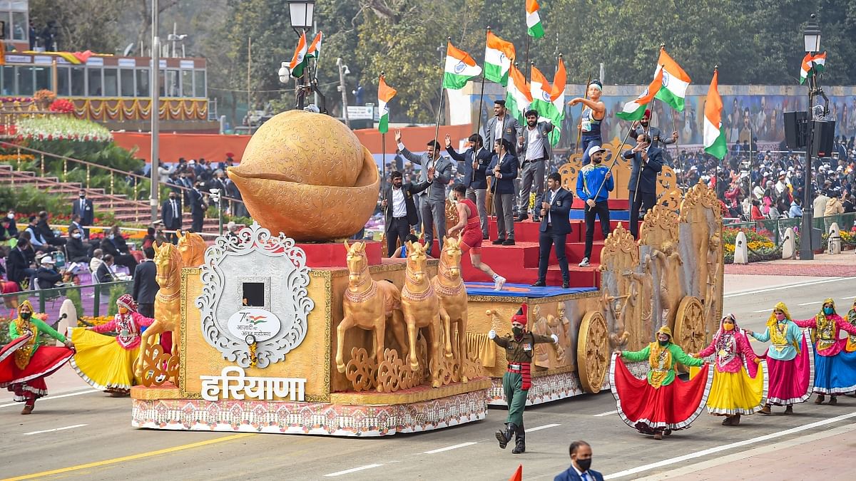 Haryana showcased its sports talent with a host of international players standing at the centre in its tableau at the Republic Day parade. The theme of the state's tableau was 'Haryana- Number One in Sports', which also had a life-size replica of Olympic gold medal winner Neeraj Chopra in javelin throwing posture, on the posterior side of the tableau. Credit: PTI Photo