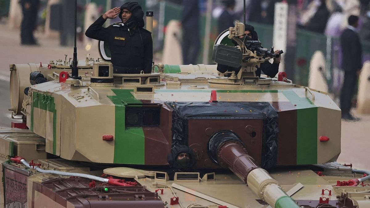 An officer salutes atop an Arjun tank during India's 73rd Republic Day parade at the Rajpath in New Delhi. Credit: AFP Photo