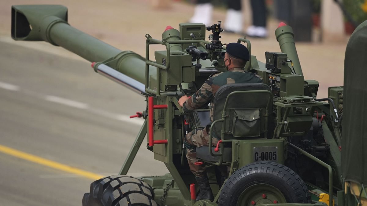 A soldier sits on a ‘Dhanush’ gun system during India's 73rd Republic Day parade at the Rajpath in New Delhi. Credit: AFP Photo